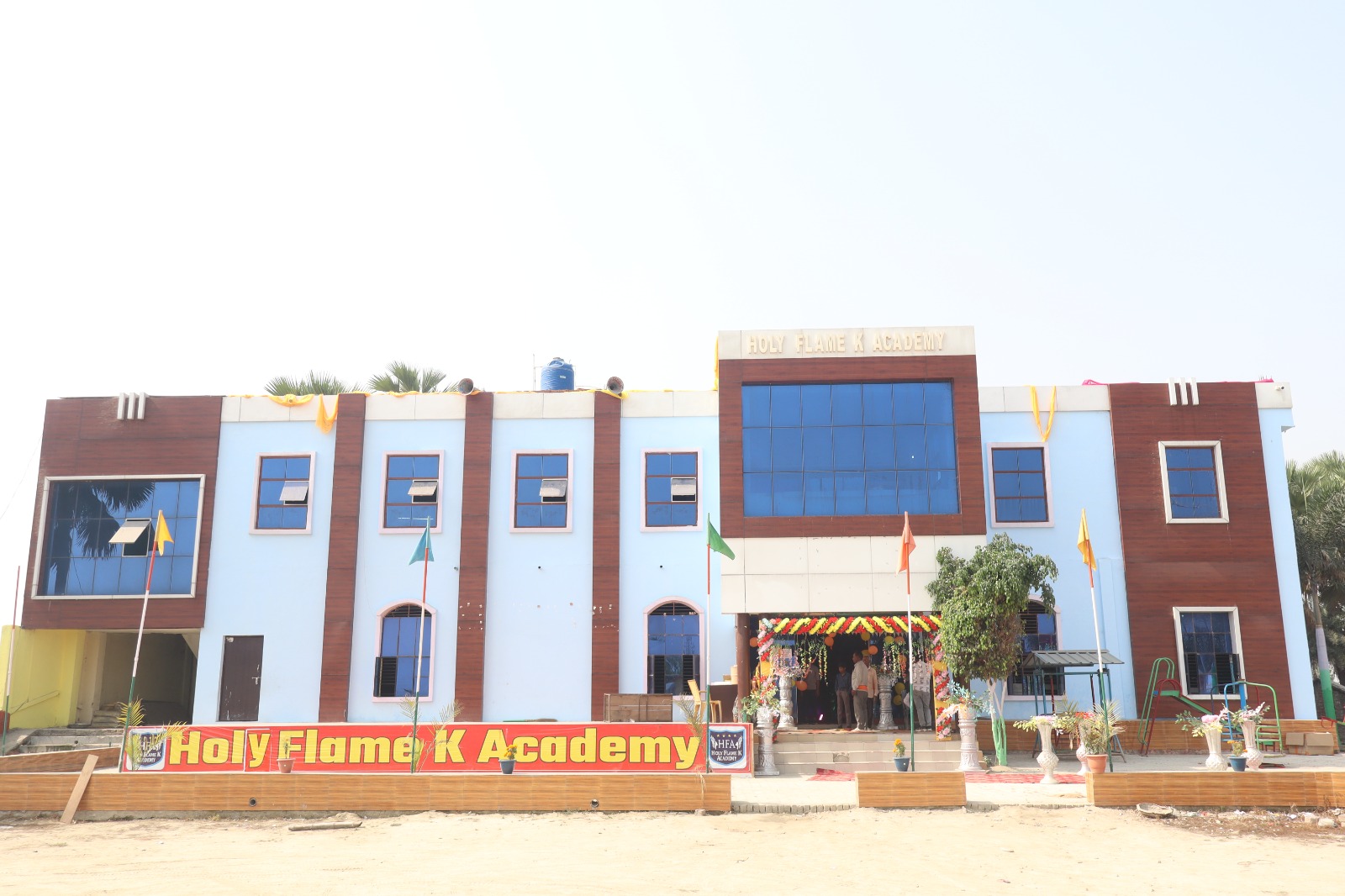 Holy Flame K Academy Kuri school building photograph